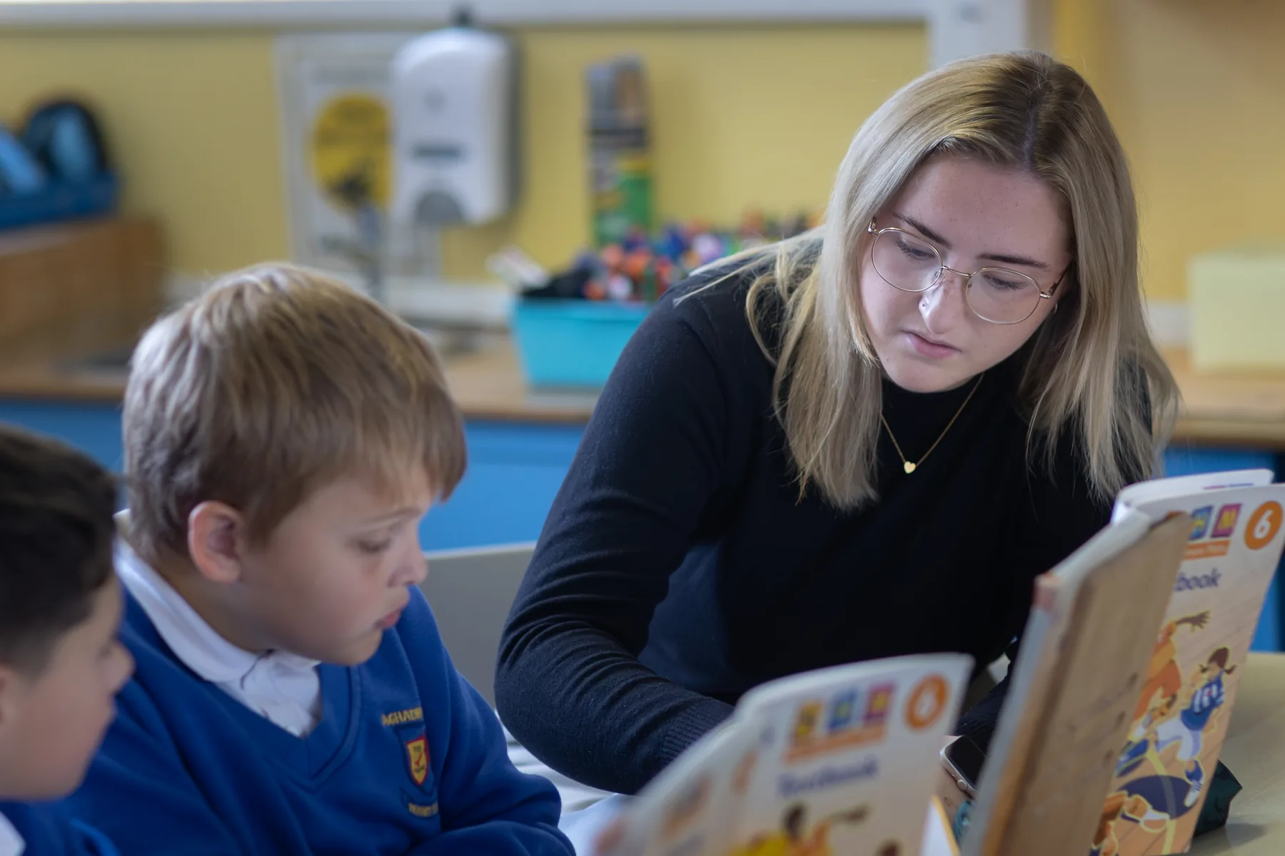 A pupil reading with a member of staff